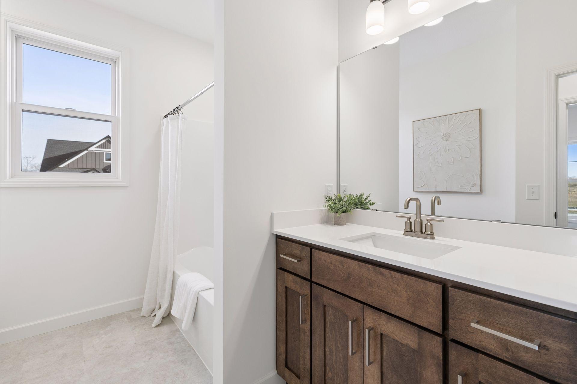 Main Bath All images of a previous Model