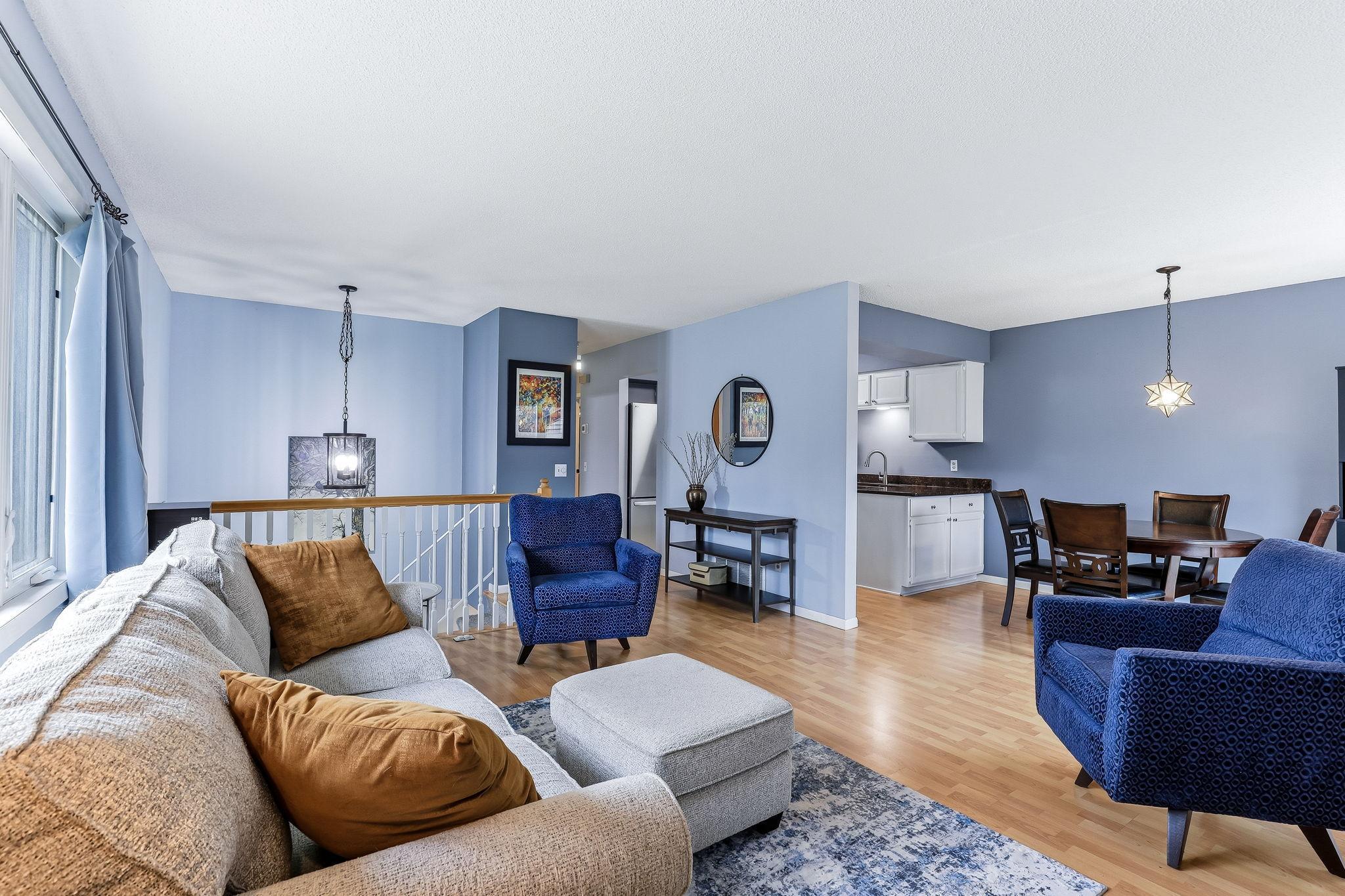 Open-concept layout connecting living and dining spaces, offering great flow for everyday living and entertaining.