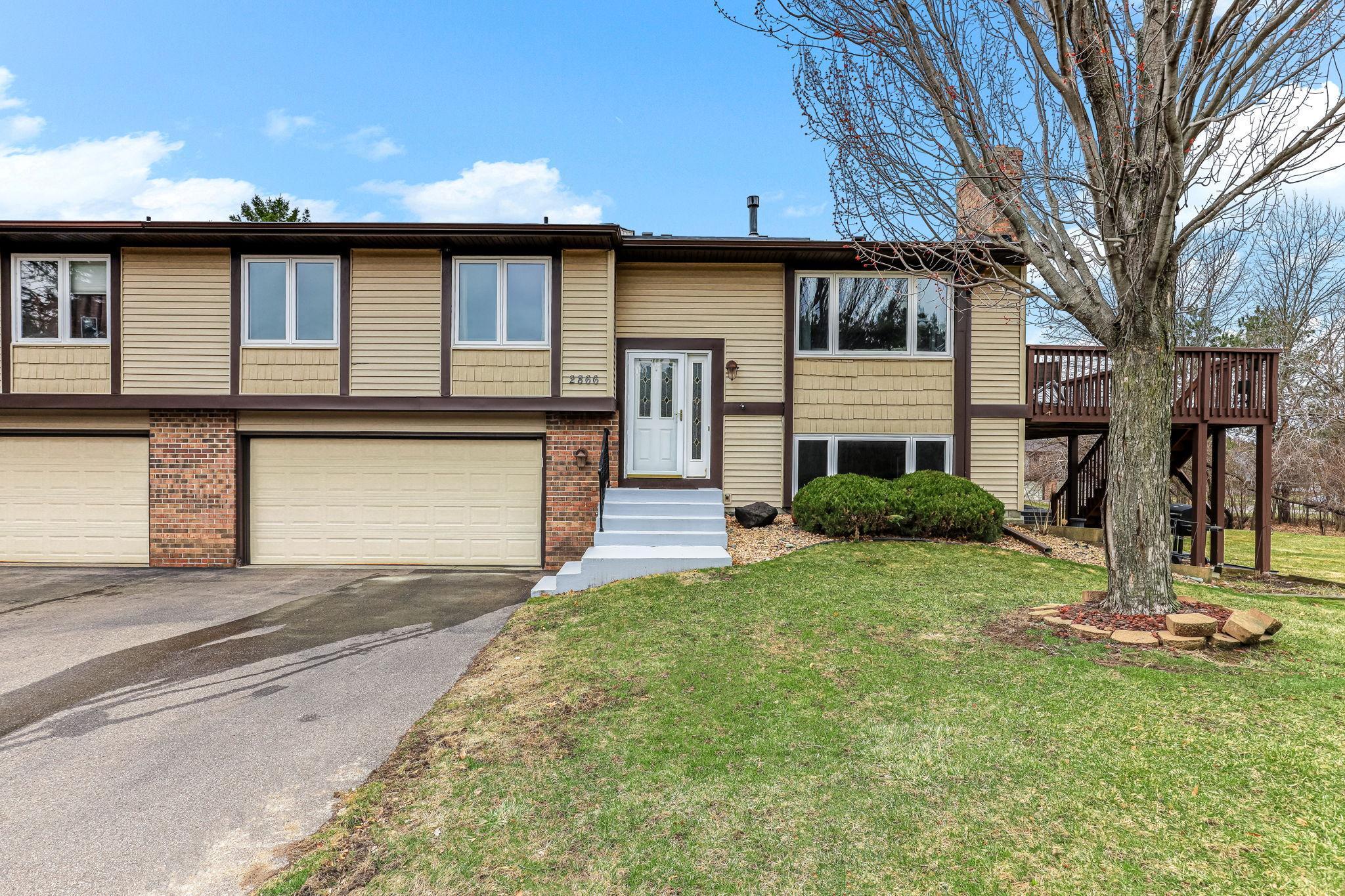 Corner-positioned home with open green space and added privacy, offering a rare townhome setting that feels more like a single-family environment.