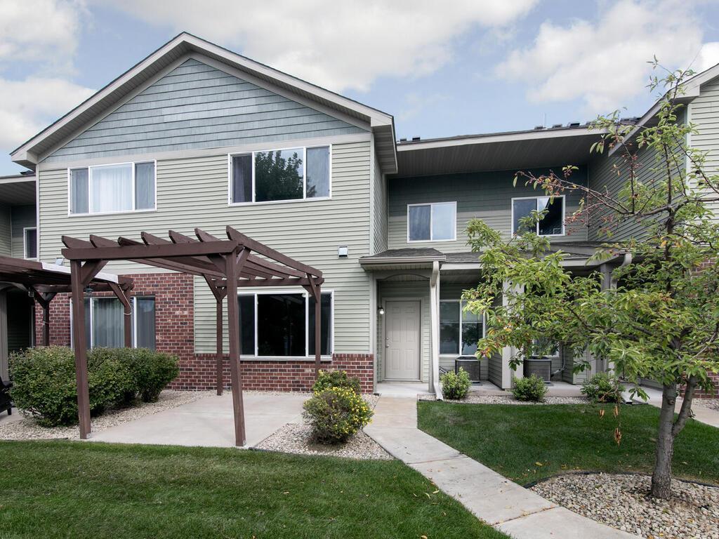 Private outdoor patio with pergola, perfect for relaxing or entertaining.