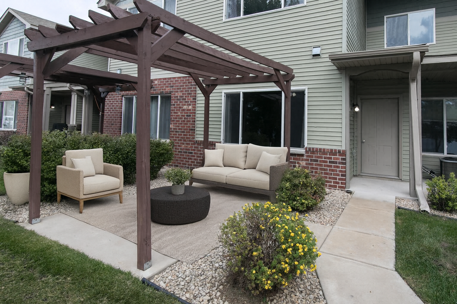 Cozy and private patio off the back on the home. *This image is virtually staged*