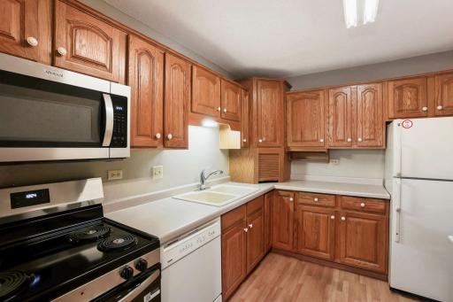 Beautiful oak cabinetry with a lot of storage.