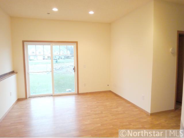 8 - Lower Level Family Room with Walkout to Patio.jpg
