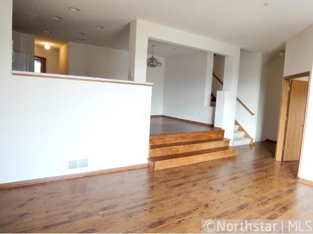 4 - Steps from Living Room to Kitchen and Dining Area.jpg