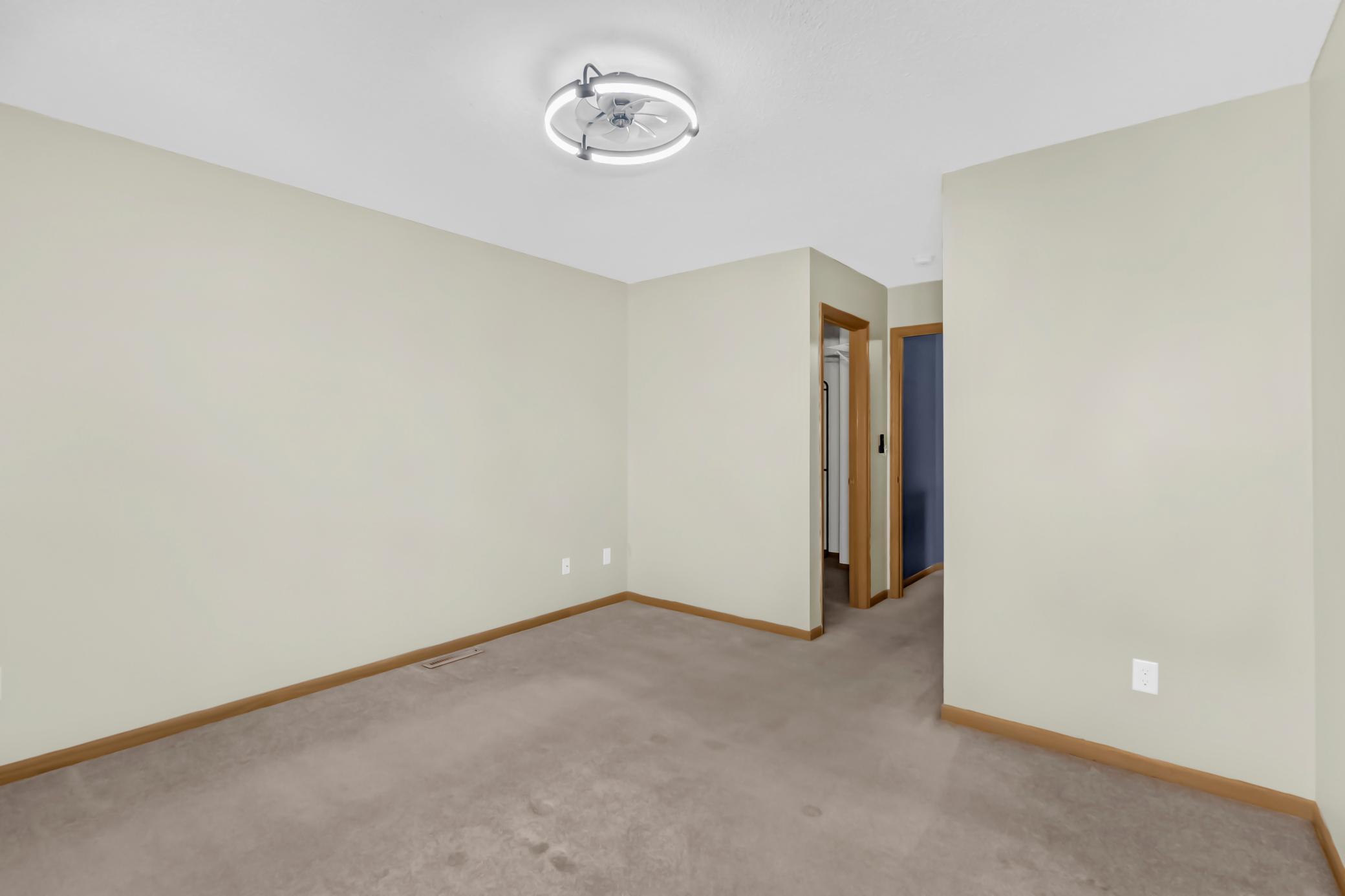 Upper Level Primary Bedroom/Walk In Closet