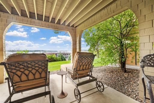 Lower Level Patio is covered from the porch above, has stunning views and concrete!