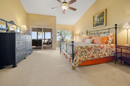 Master Bedroom features patio door access to the screen-in porch