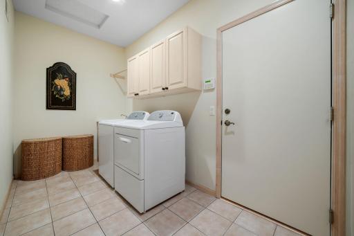 Ceramic tile flooring and garage entry door
