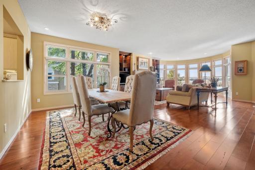 Dining Room features stunning "one-of-a-kind" light fixture and open to the Living Room