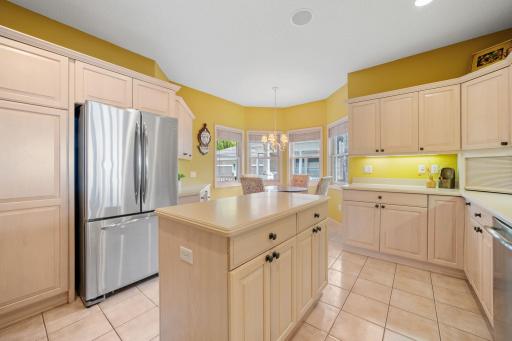 Solid surface countertops and ceramic tile flooring