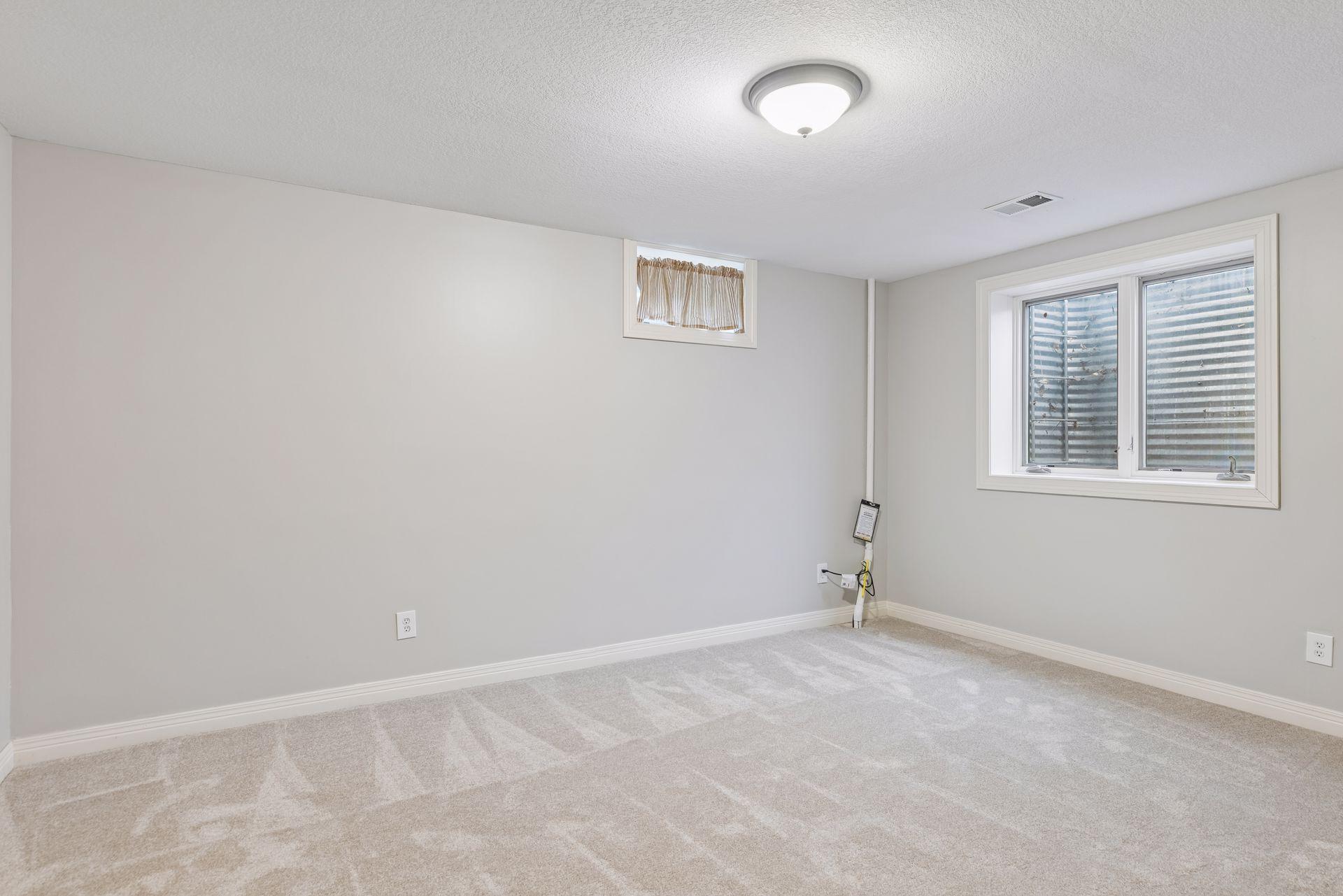 This lower level bedroom is the perfect set up for overnight guests.
