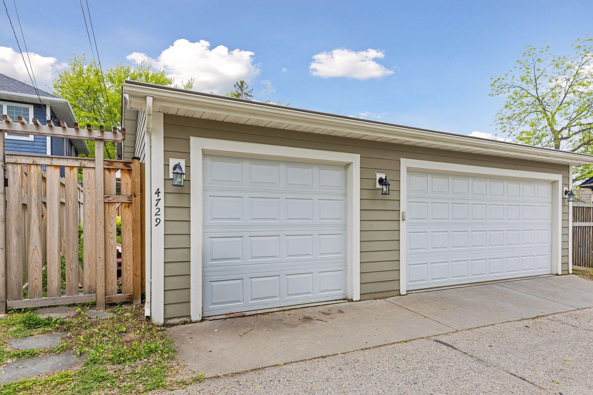 Double door + a Single Door for the 3 Car Garage.