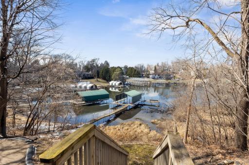 Though in need of updated decking, dock, stairs, and landscaping, it offers a private connection to the bay.