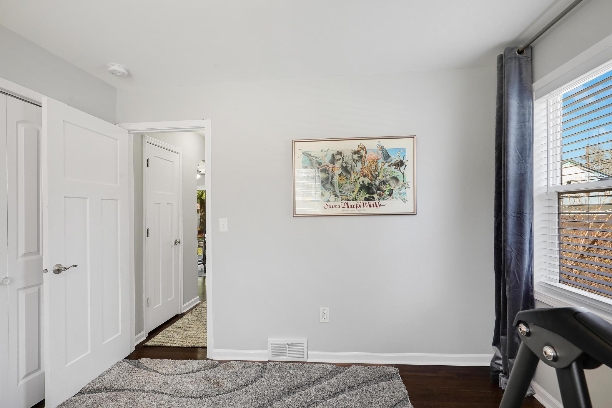 View of the linen closet just off the full bathroom.