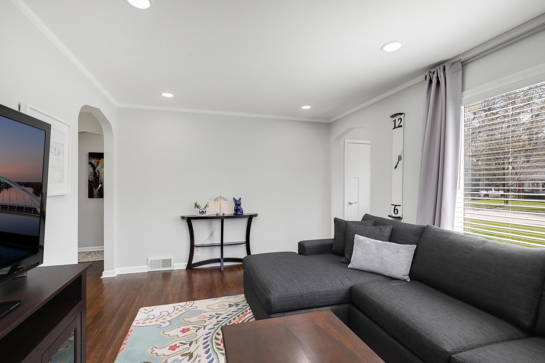 You'll love the charm of the original archways from the front door to the dining and main level 2 bedrooms.