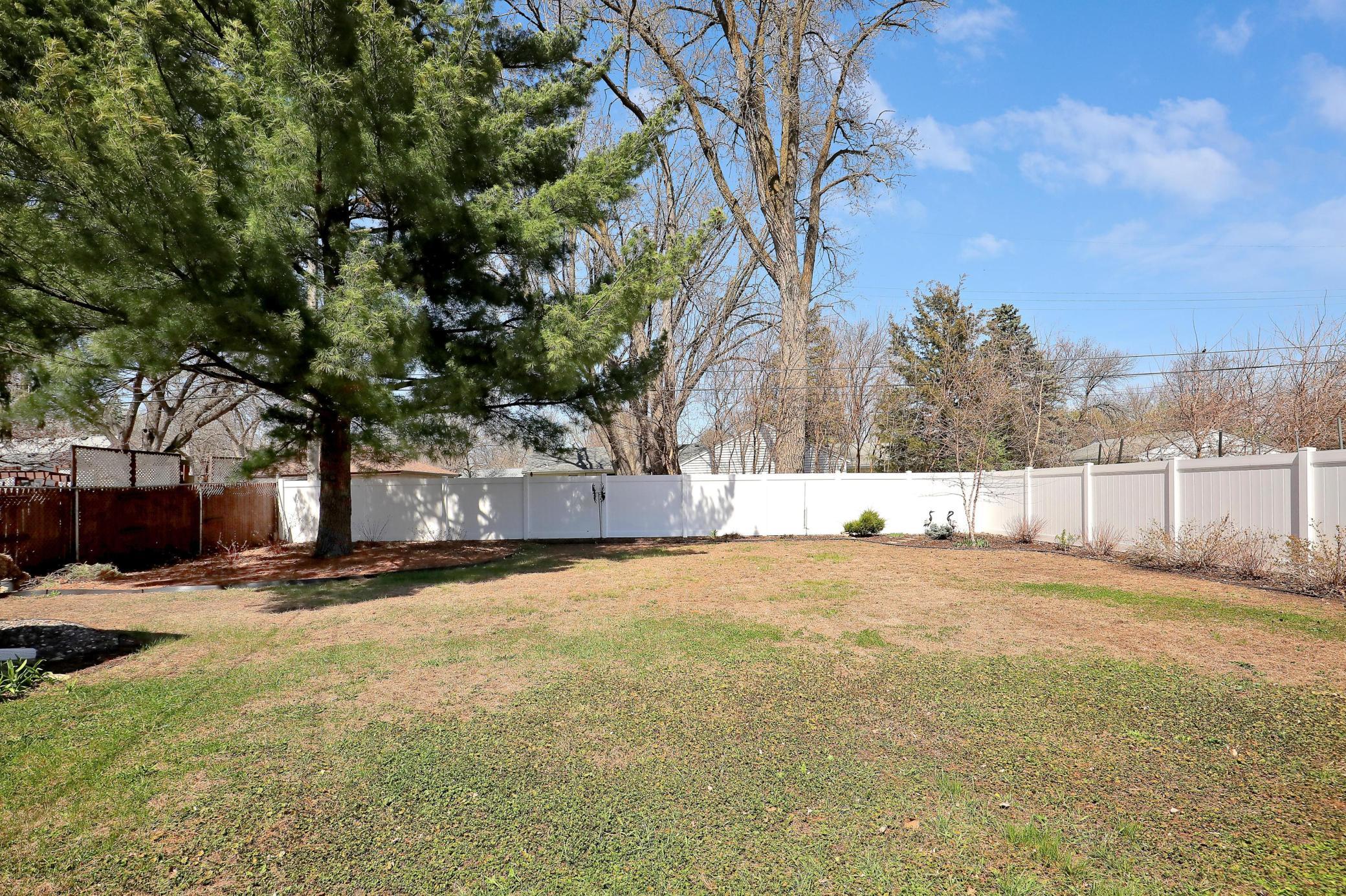 Fully fenced FLAT backyard! For those of you that appreciate plants/flowers/trees/shrubs this home will amaze you with the stunning variety &colors that have been lovingly planted by the current owner. Don't miss the plant list on MLS supplements.