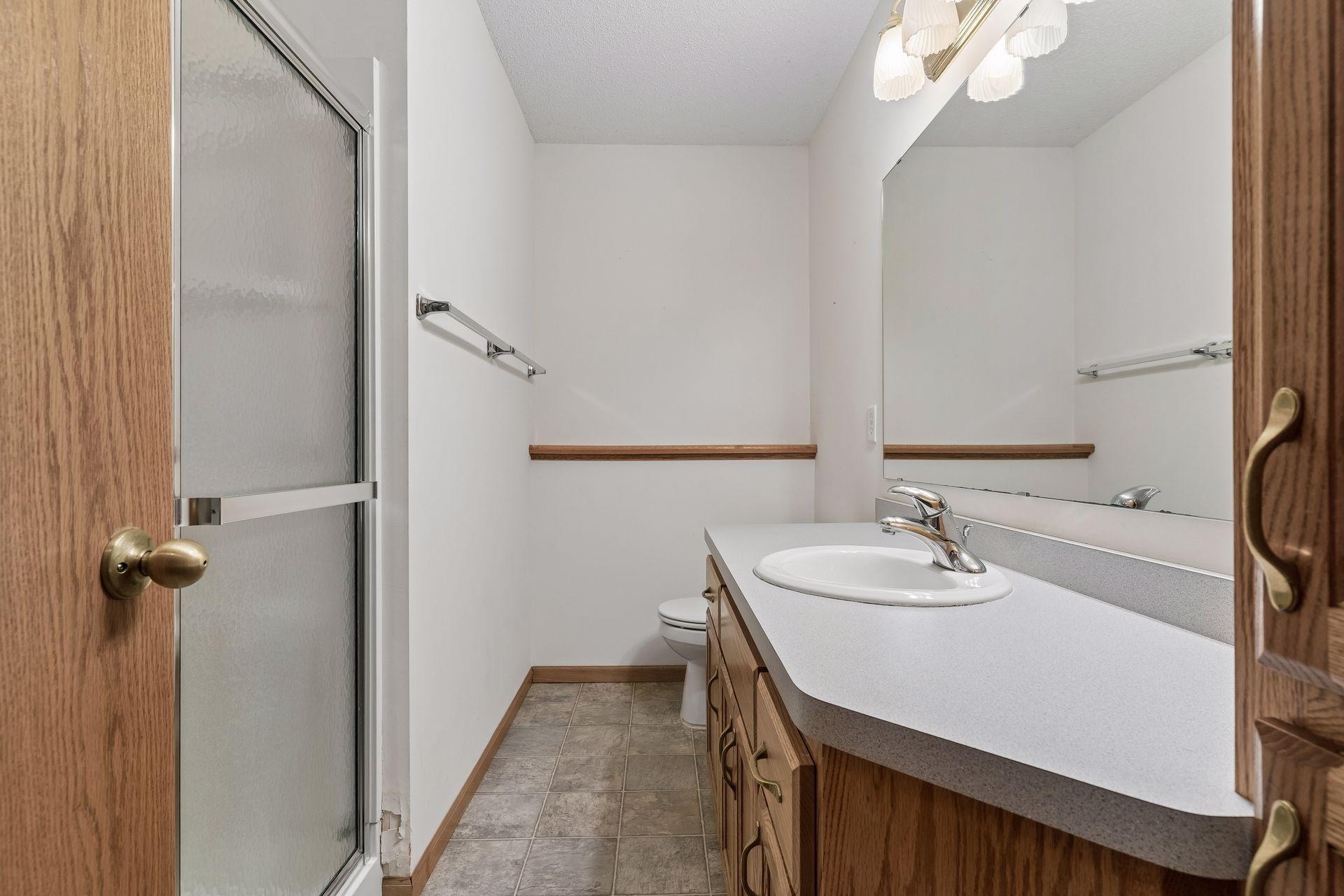 3/4 bathroom downstairs is convenient to the bedroom and family room area.