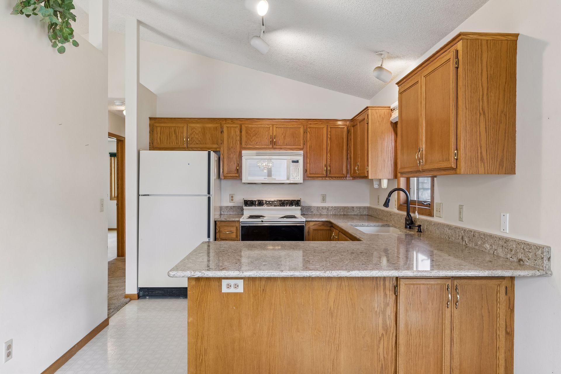 Lots of oak cabinetry for storage