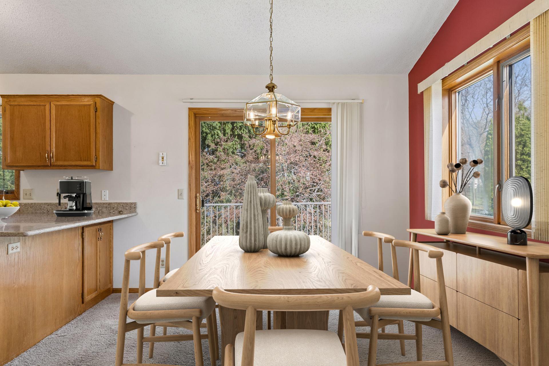 Dining room is right off of the living room and kitchen. Dining room is virtually staged.