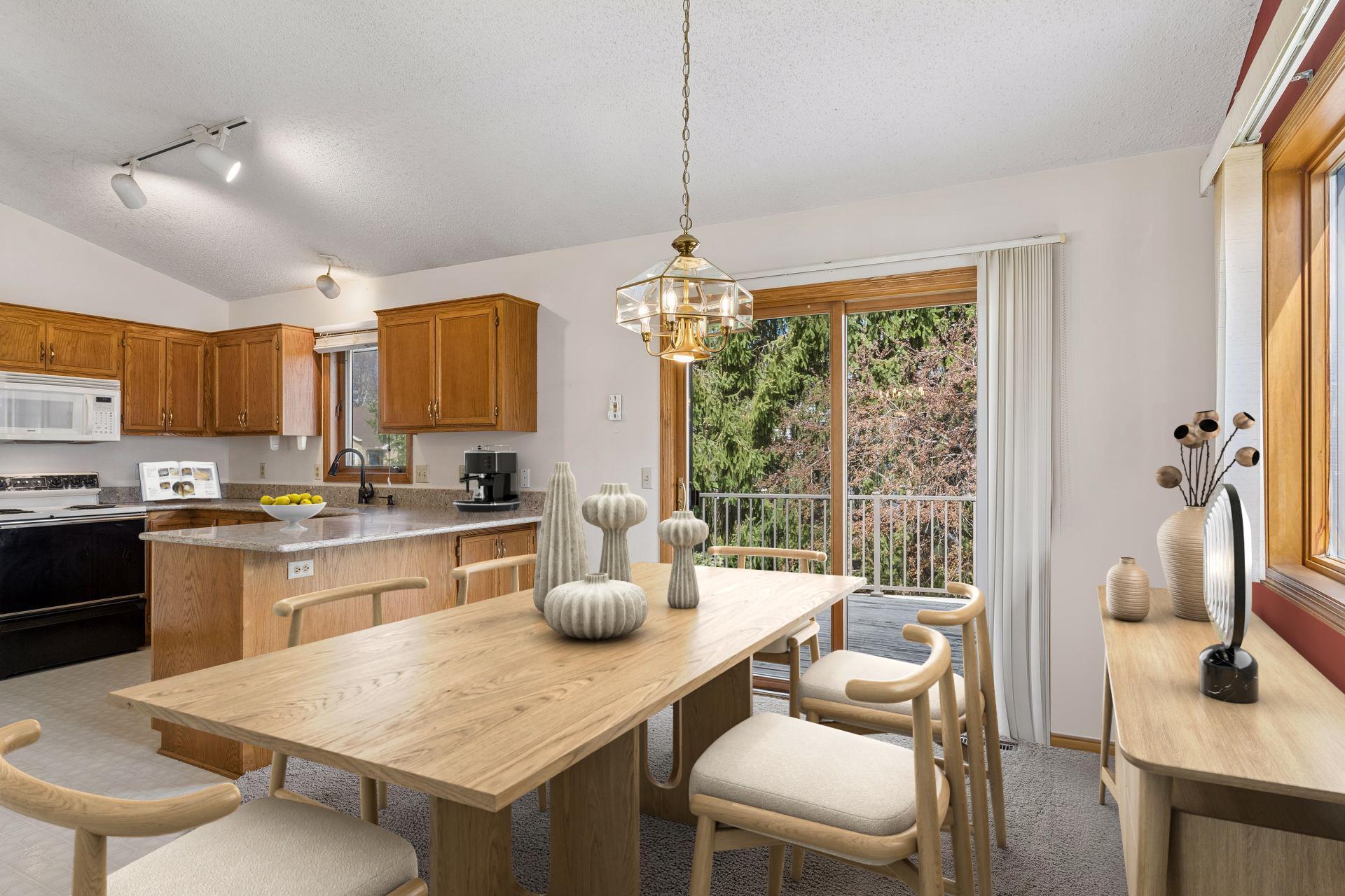 Virtually staged photo of kitchen/dining