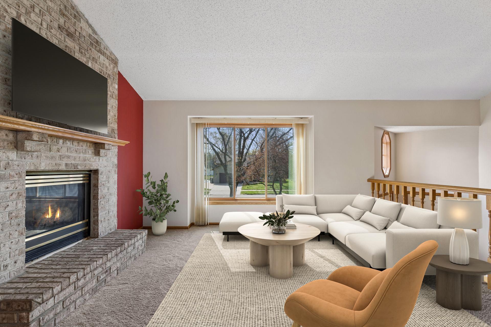 Large picture window in a cantilever bathes the living room in sunlight. Living room virtually staged.