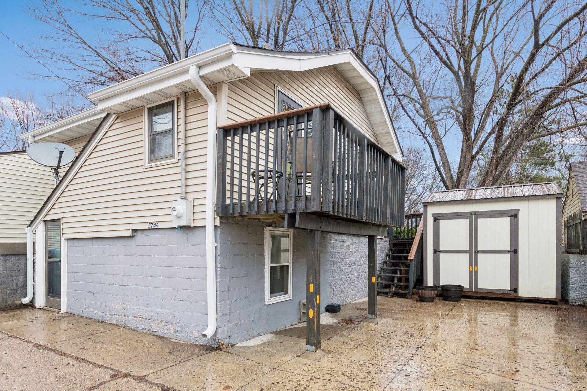 Off street parking with storage shed.