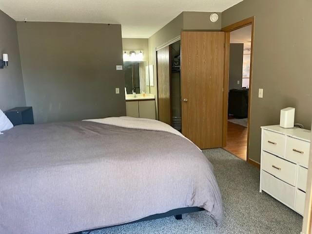 View of the primary bedroom from the balcony.