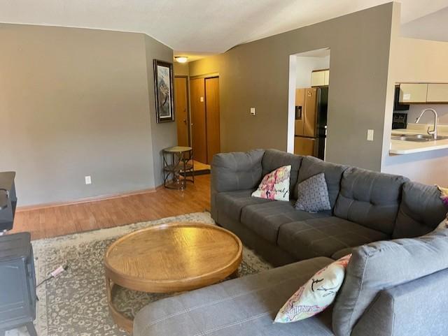 Roomy living area with vaulted ceilings.