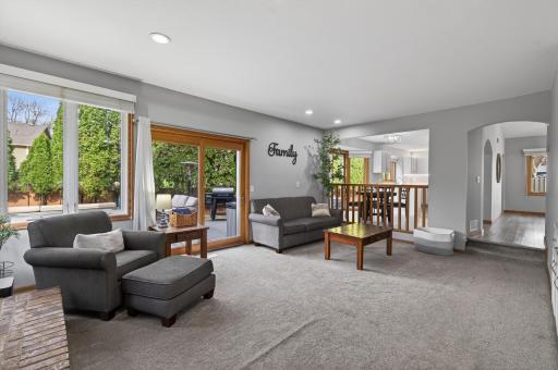 Main floor family room steps out to the deck