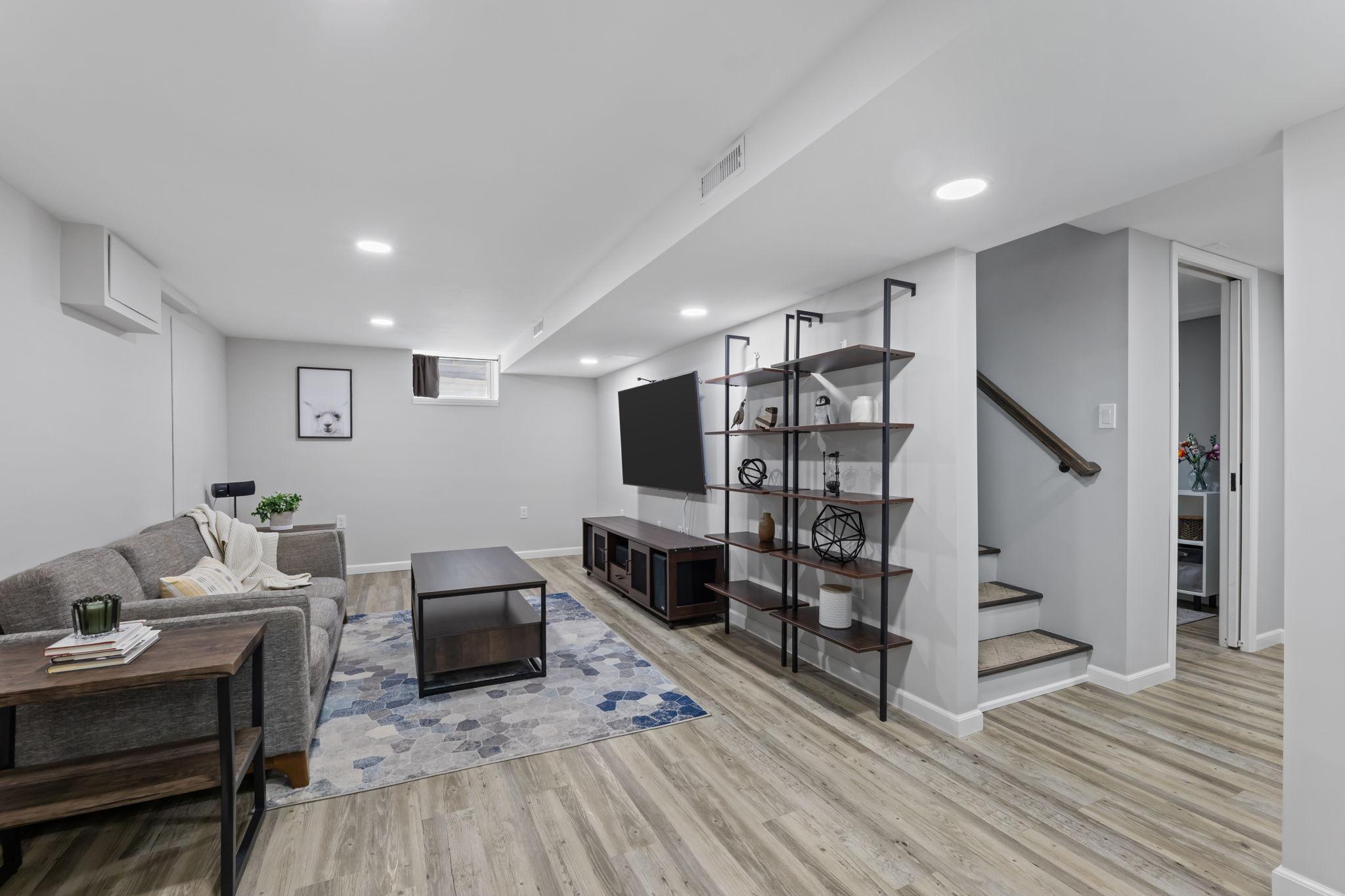 Enjoy movie nights in the fully renovated lower-level family room, complete with surround sound wiring