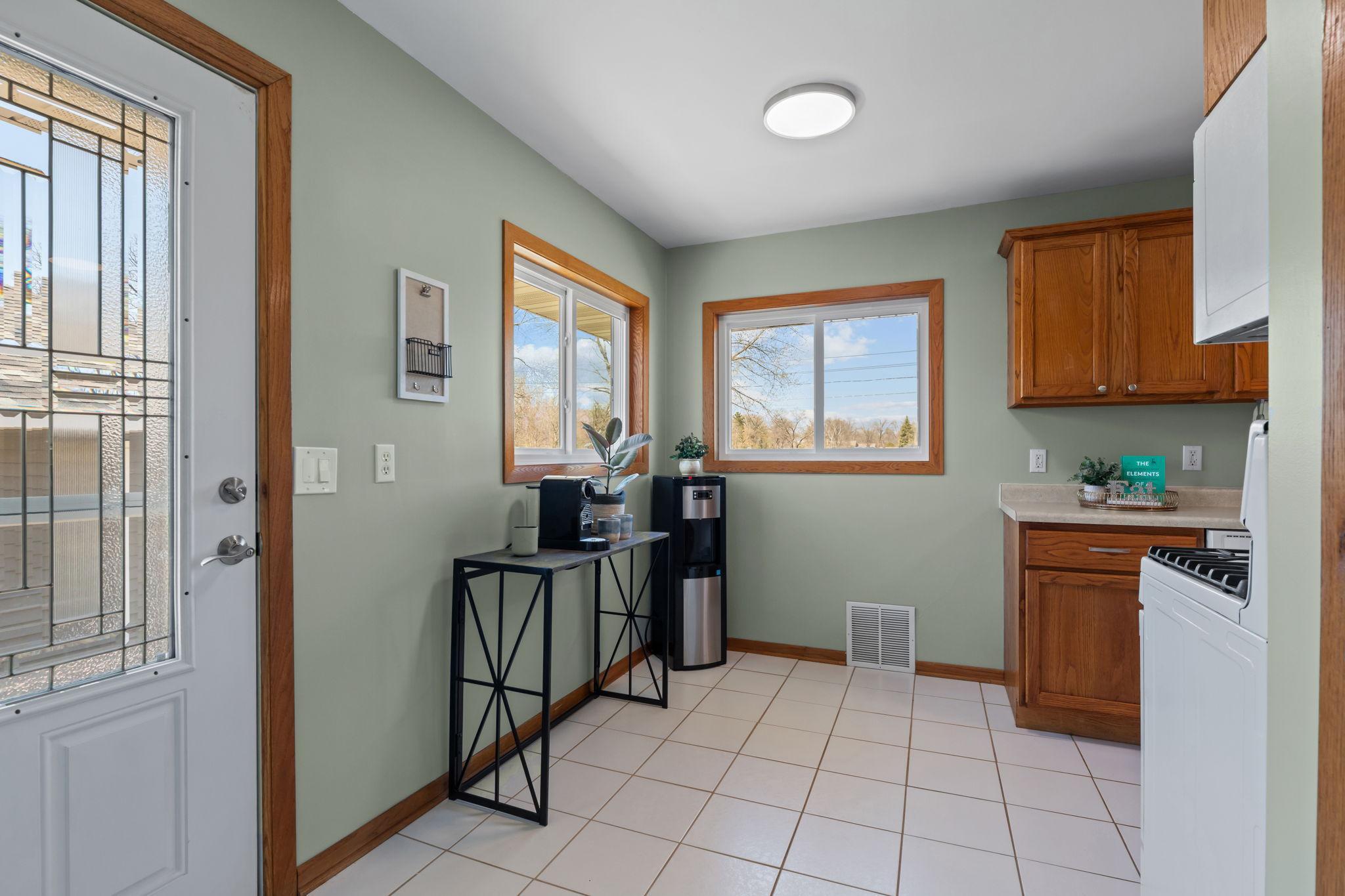 Convenient side entry leads directly into the kitchen, making grocery trips a breeze.