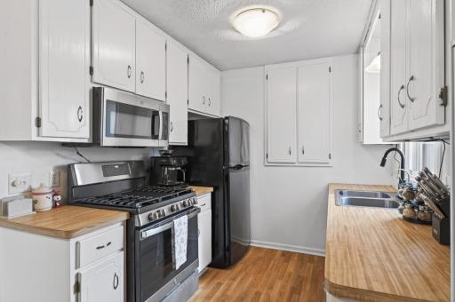 Newer gas stove, dishwasher adds updated touches.
