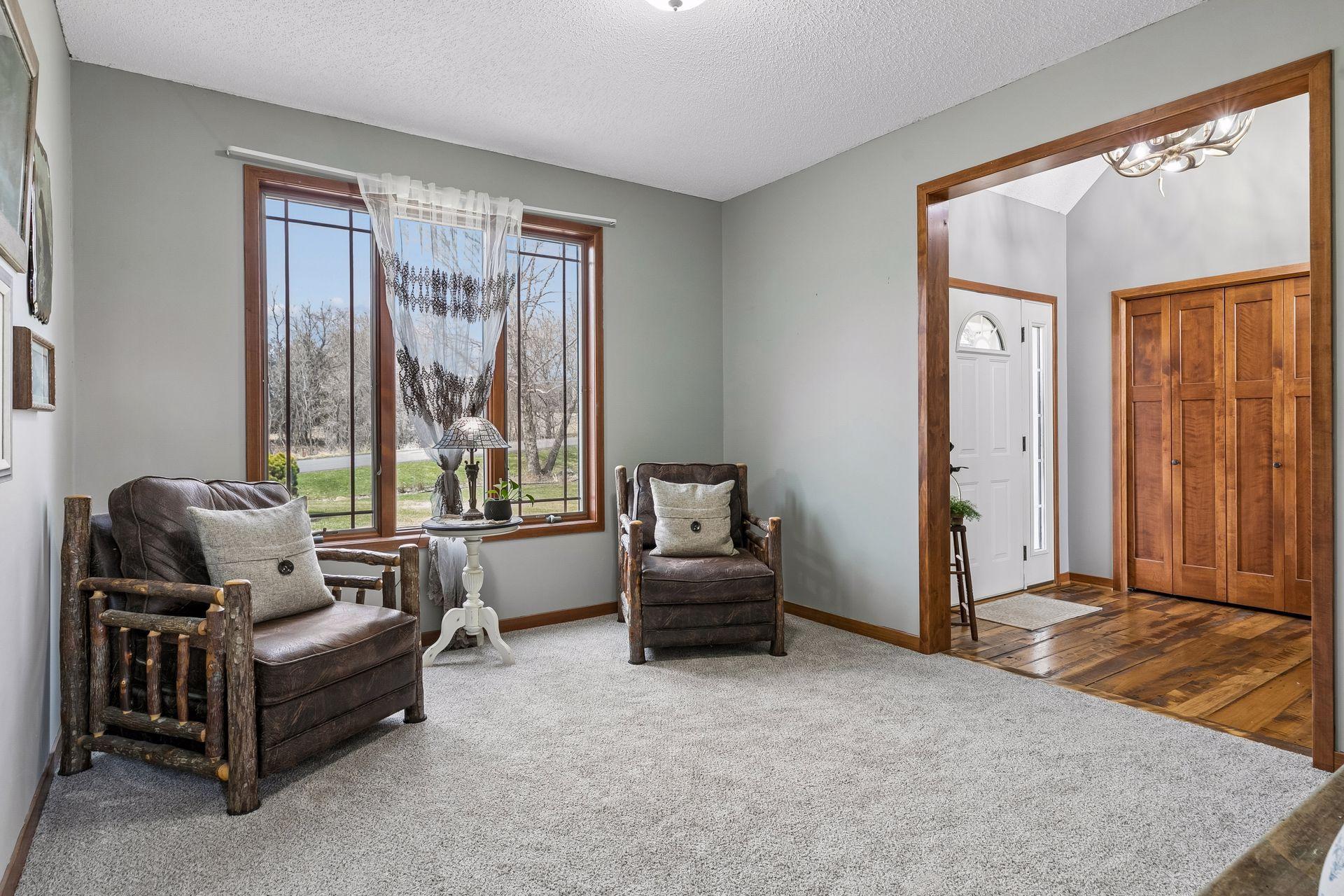 Additional view of the front room with great natural light and flexible use.