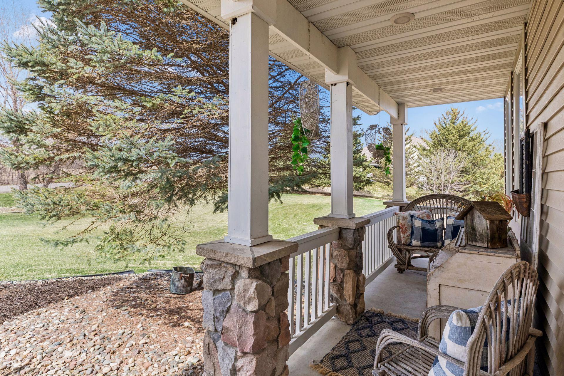 Welcoming front porch—great spot to sit and enjoy the peaceful setting.