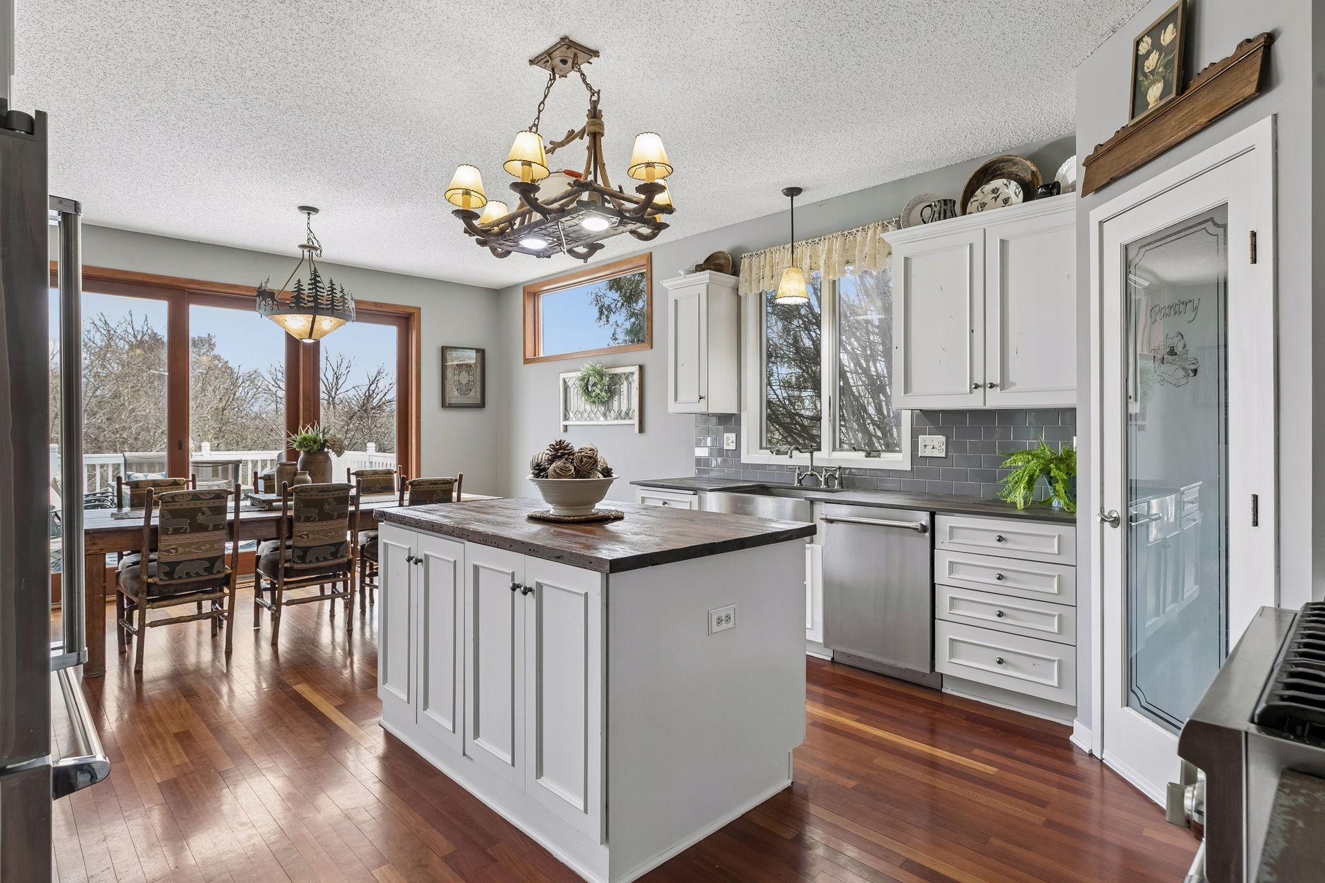 Center island with wood countertop—ideal for prep or gathering.