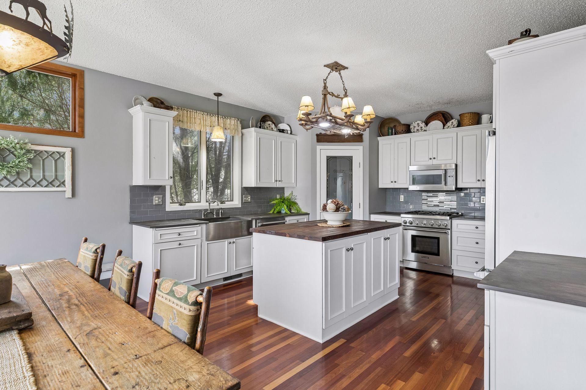 Large Kitchen with center island, stainless appliances, and plenty of cabinet space.