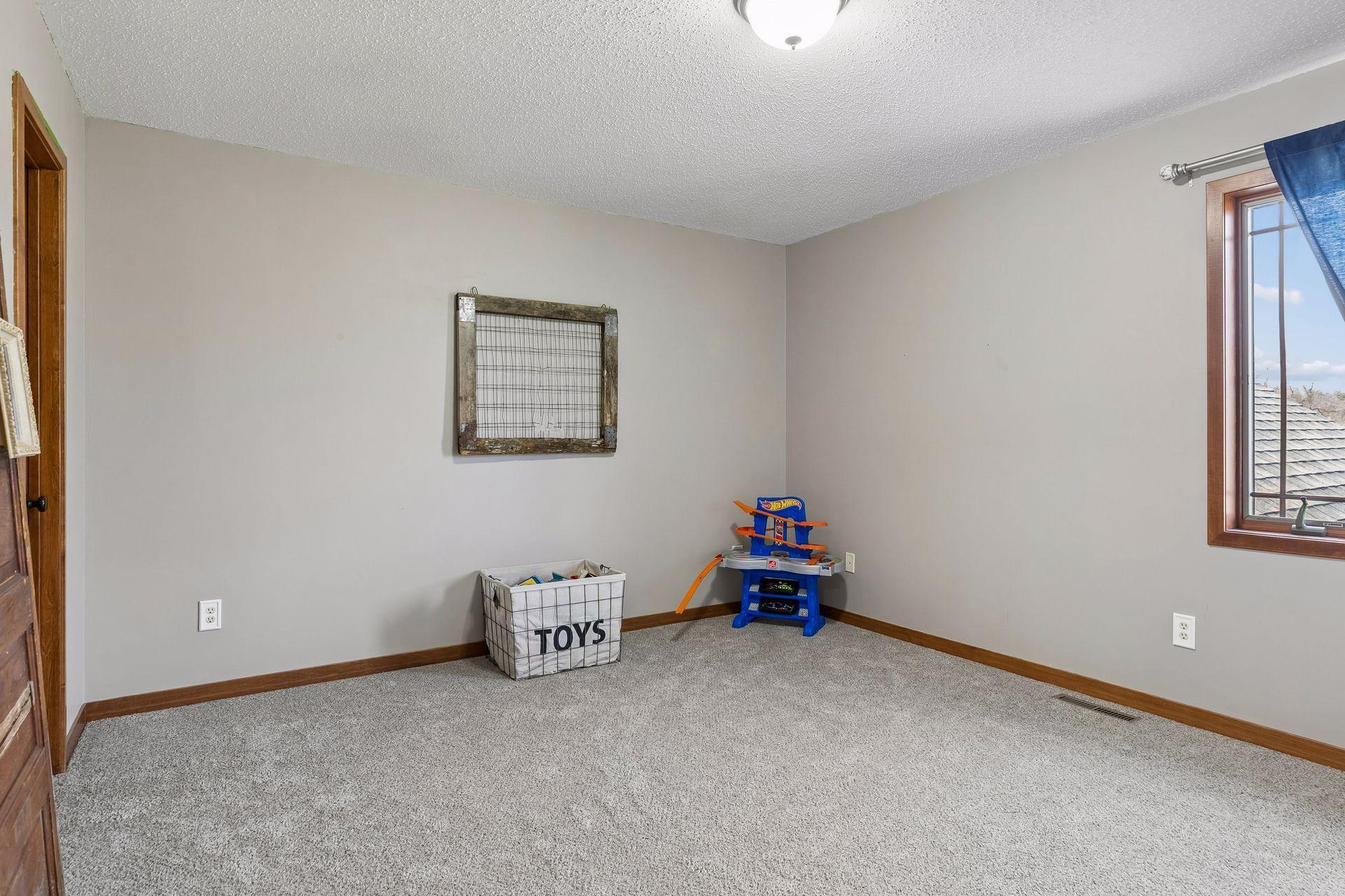 Bedroom 2 of 3 Upstairs, this one also has another Walk in Closet