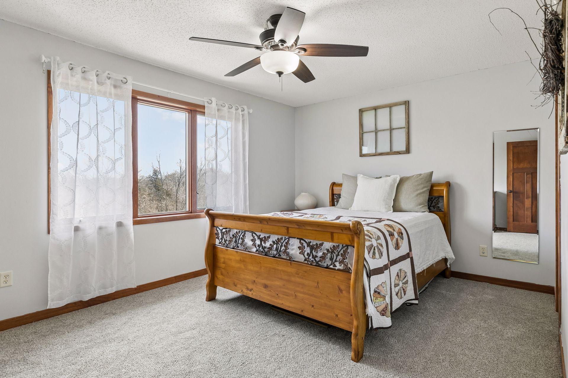 1 of 3 Bedrooms Upstairs, this one has a Walk in Closet.