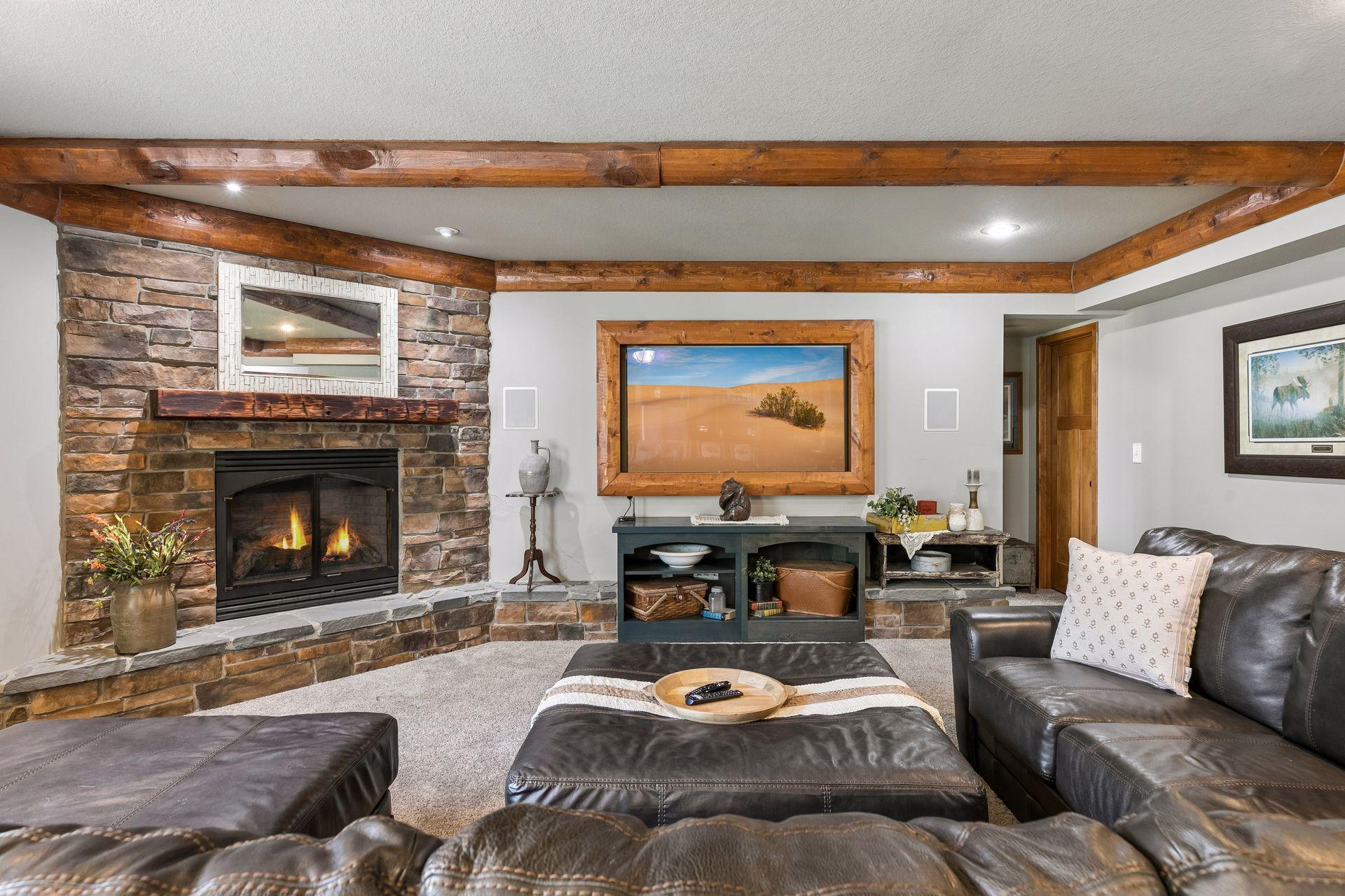 Lower Level Family Room with Corner Gas Fireplace.