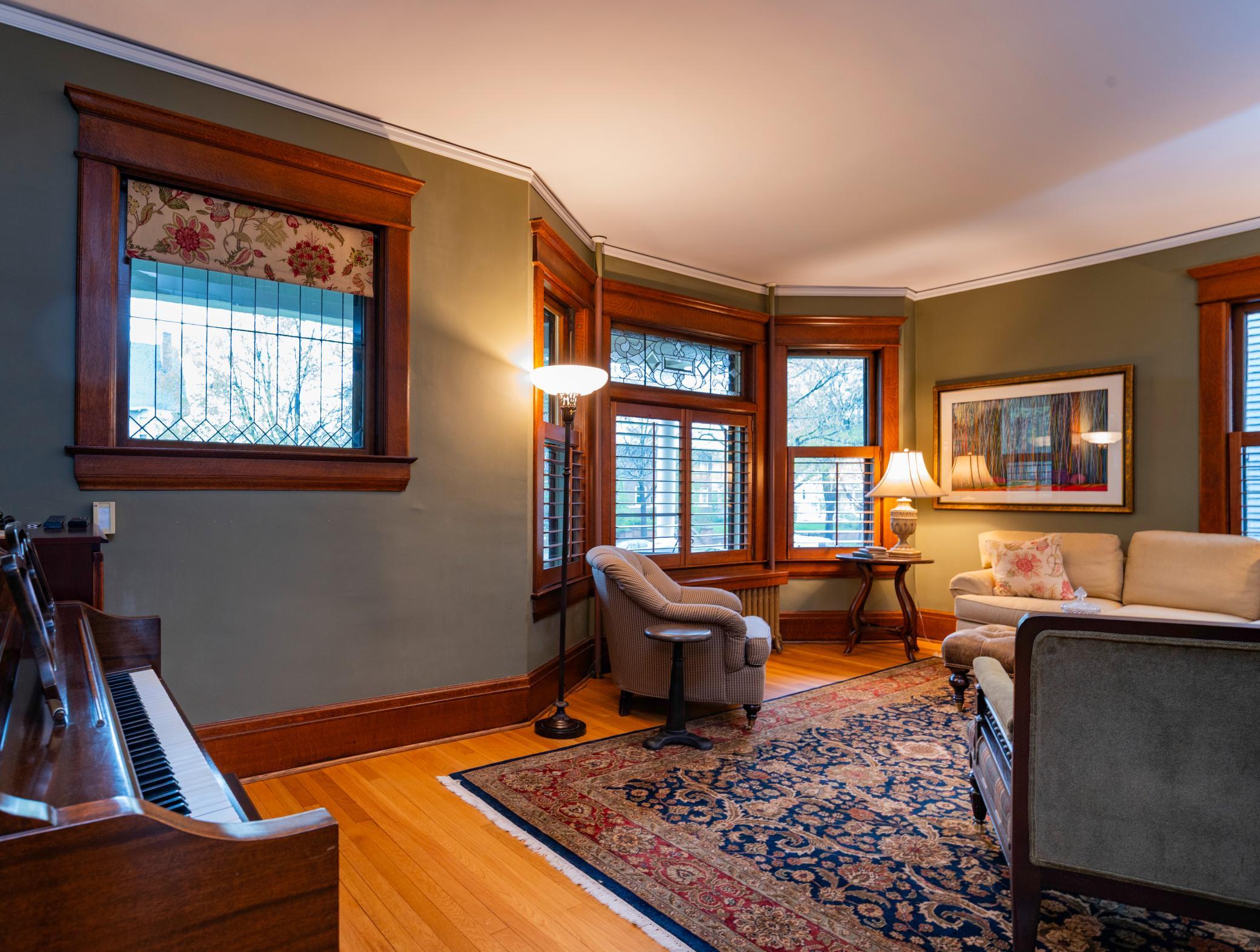 The main floor has been thoughfully updated with historically correct paint colors to accentuate the original woodwork throughout this level.