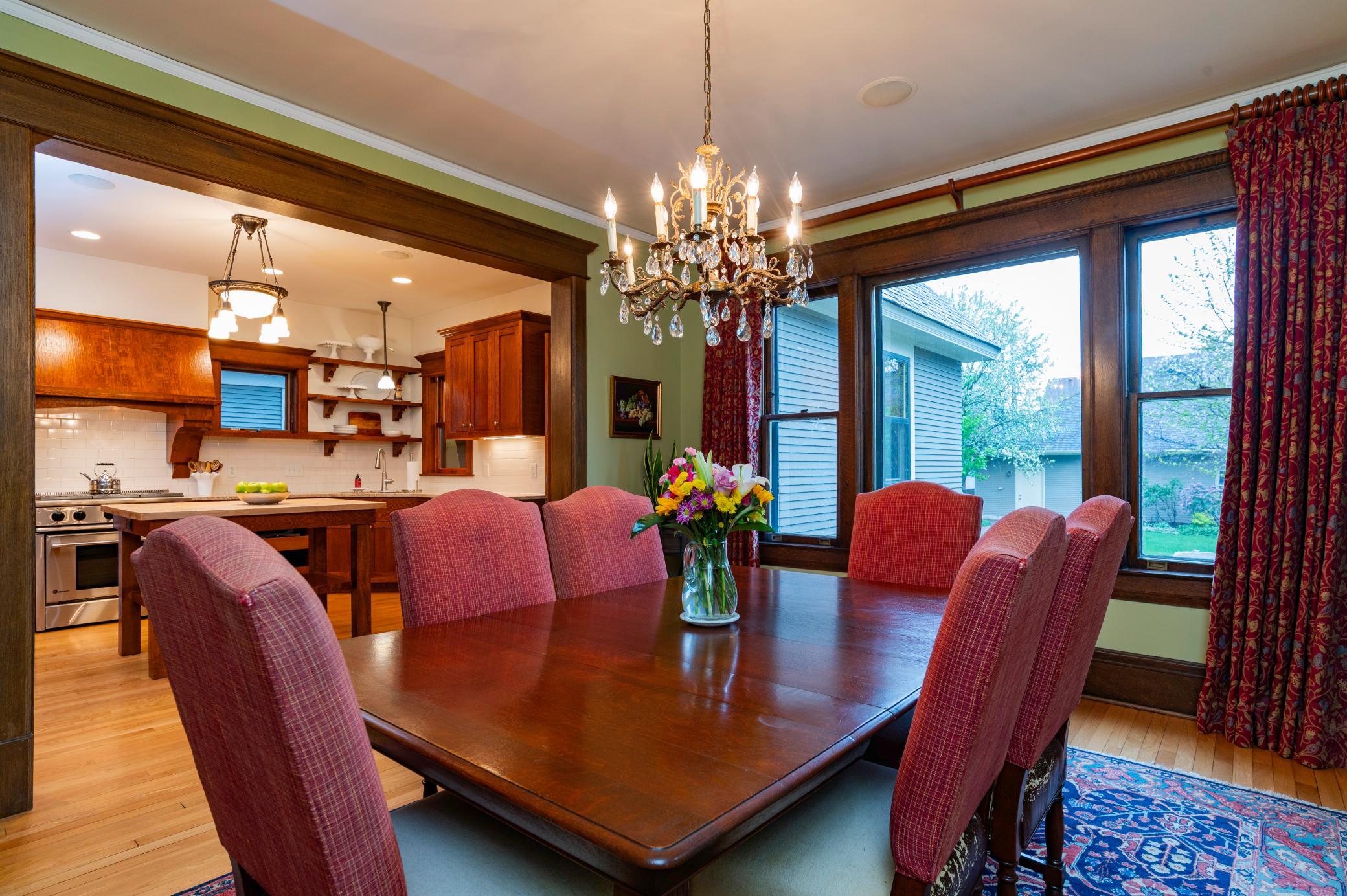 The dining room flows perfectly into the kitchen, ideal for family meals or entertaining.