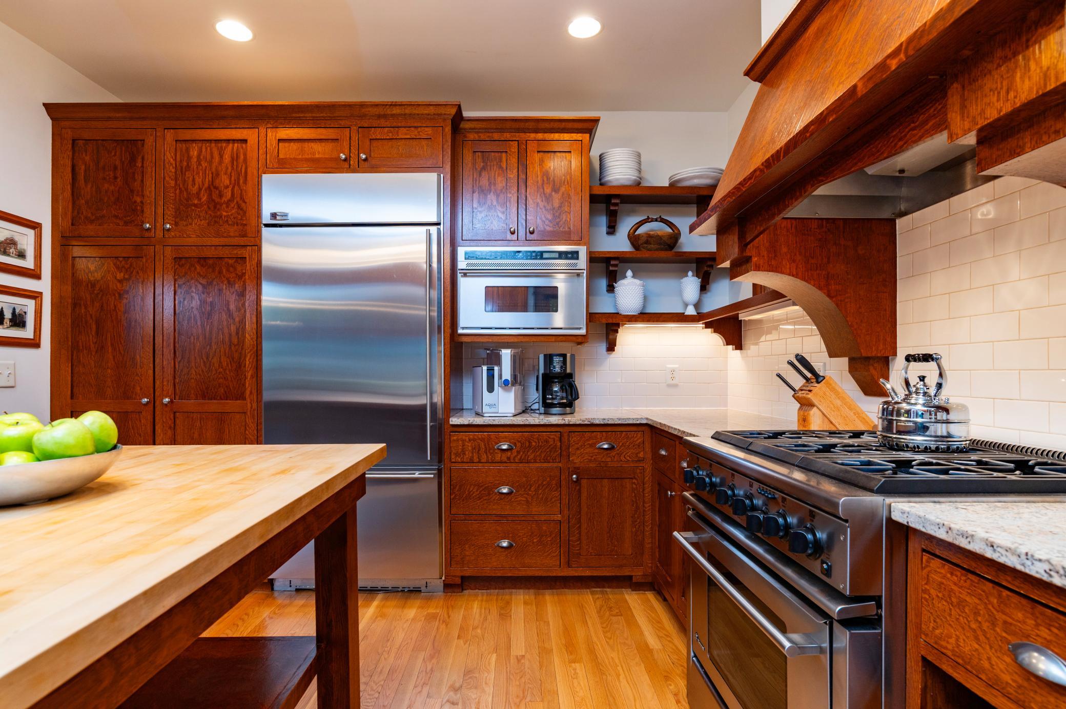 High-end kitchen appliances complete this timeless renovation.