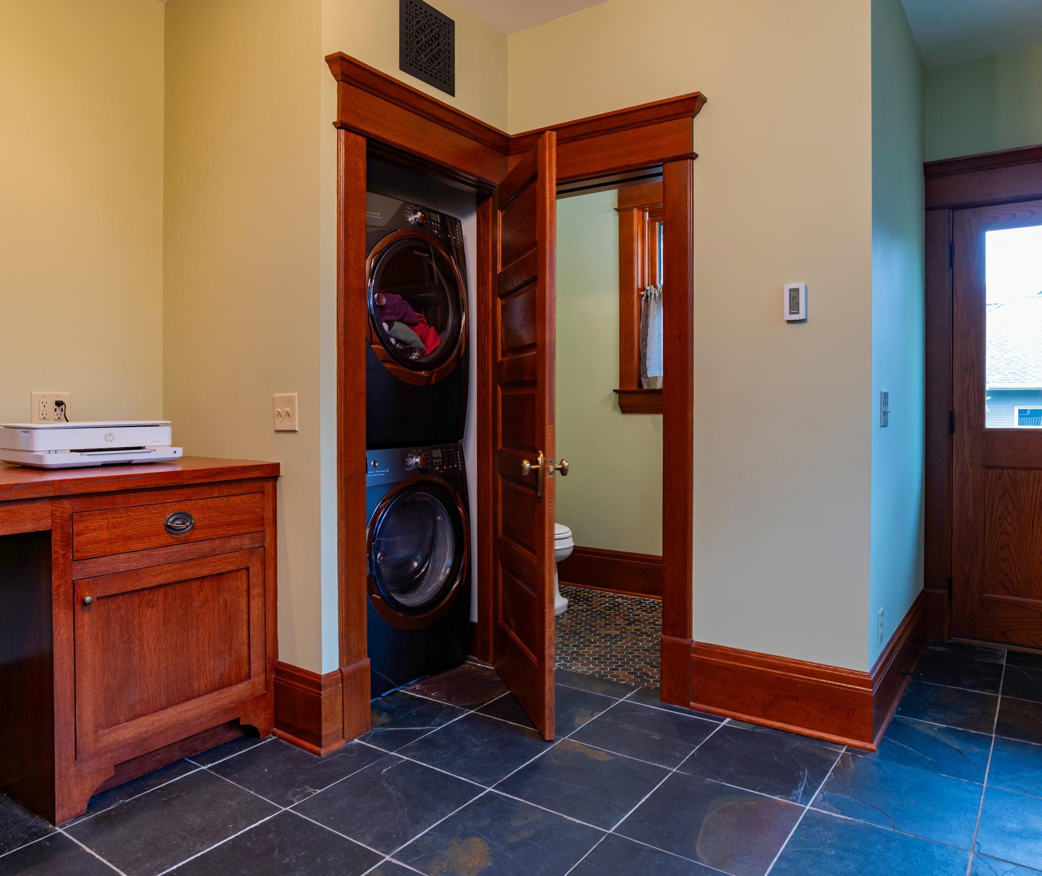 Never haul clothes to the basement again with the main floor laundry closet!