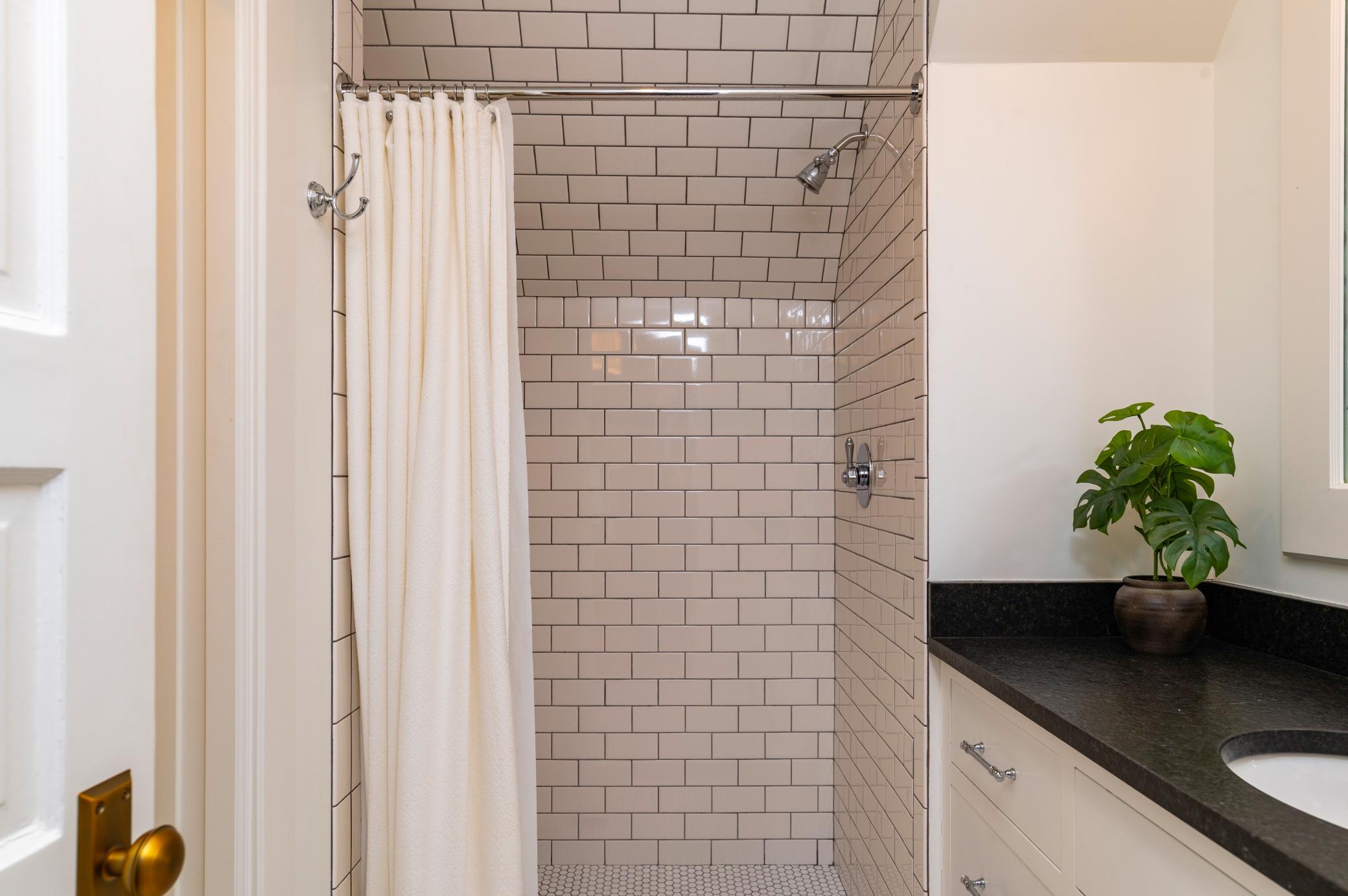 Stunning subway tile in the walk-in shower.