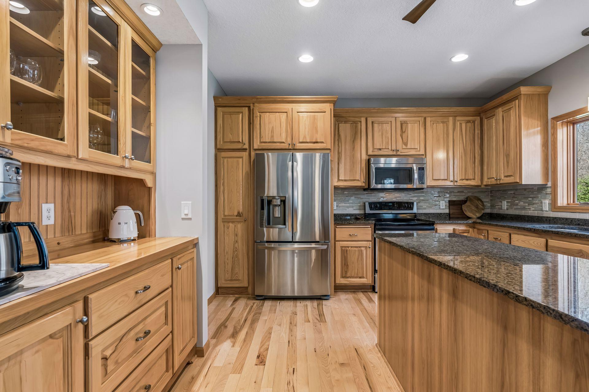 Stainless appliances and granite countertops.