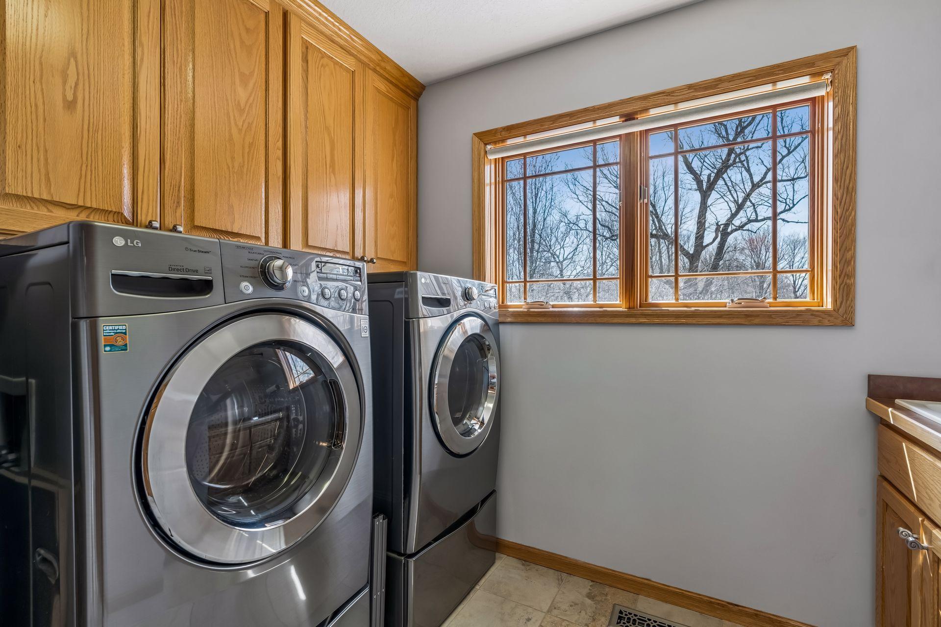 You love the laundry room on the upper level with the bedrooms!