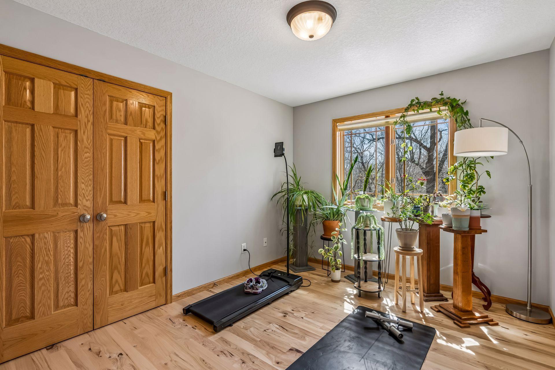 This bedroom set up as a conservatory and exercise room.