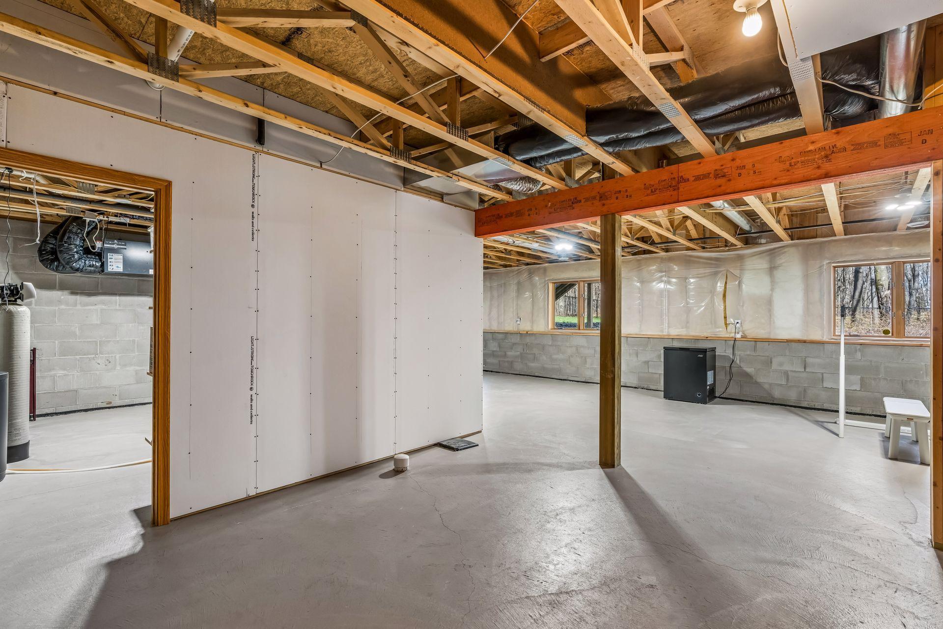 The lower level awaits your finishing ideas.