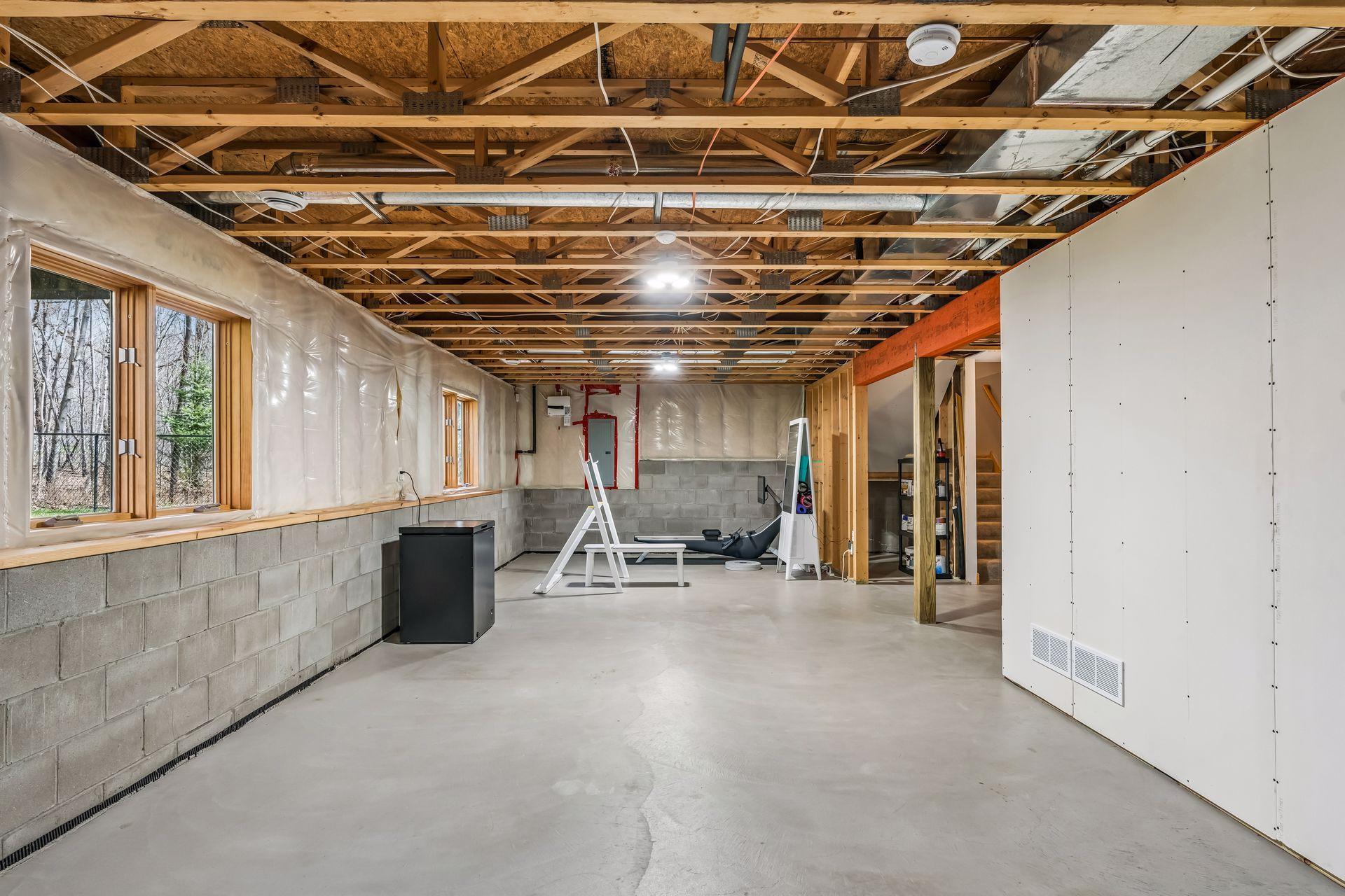 Windows bring in natural sunlight to the lower level.