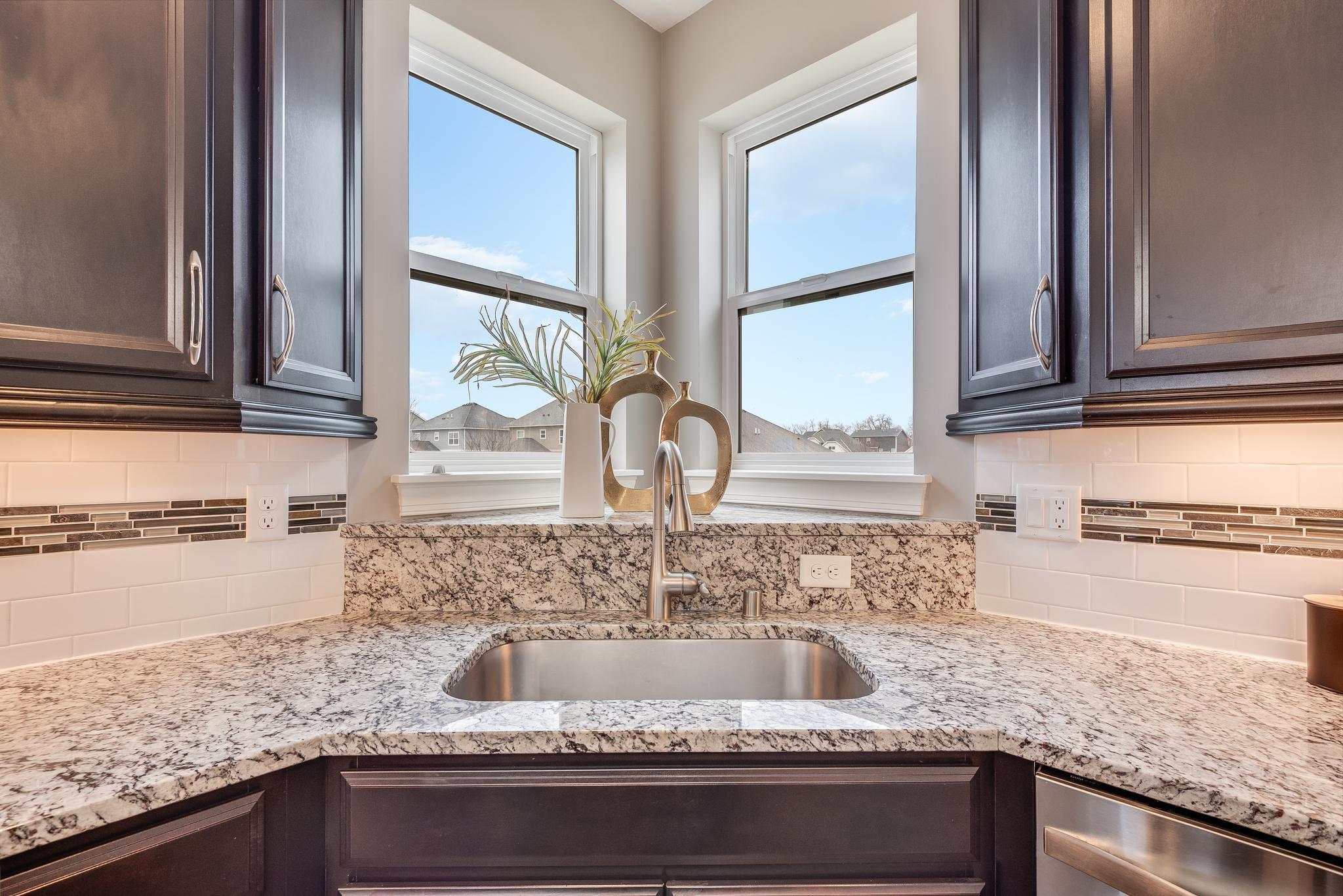 Corner sink with two windows overlooking the yard